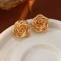 Elegant gold twisted flower stud earrings with a polished metallic finish in a pair - Gold Twisted Hollow Flower Stud Earrings