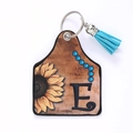 Western style leather sunflower earring-shaped keychain with blue fringe and letter E - Letter E