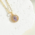 Goldene Halskette mit lila Hamsa-Anhänger und blauem Evil-Eye-Detail - Lila