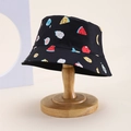 Detail of kids black bucket hat with colorful all-over fruit print and reinforced stitching - Kids One Size / Black (Cartoon Fruit)