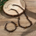 Bohemian men's jewelry set with coconut shells and tiger eye stones on wood - Tiger Eye Necklace + Bracelet Set