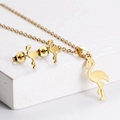 Golden titanium flamingo jewelry set including necklace and matching stud earrings - Crane