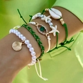 Set di 5 braccialetti boho con conchiglie e ciondoli occhio greco verde da spiaggia - Verde (26165-green)