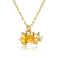 Detail of 18K gold-plated dinosaur necklace with a sparkling pear-shaped yellow gem - Yellow Triceratops (XL00308)