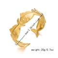 Detailed view of golden fish pattern open cuff bracelet with 6cm diameter and 20g weight - Fish Pattern