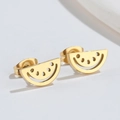 Close-up of golden hollowed-out watermelon stud earrings with minimalist metal details - Gold