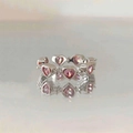 Elegant silver open ring with pink heart-shaped crystals on reflective surface - Heart Pink Zirconia Open Ring / Pink