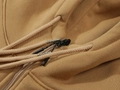Brown hooded sweatshirt featuring textured knit fabric and metal-tipped drawstrings - Camel