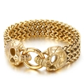 Punk style golden stainless steel bracelet featuring dual skull heads with woven chain - Skull / Gold