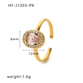 Golden ring featuring a pink oval gemstone surrounded by small white zircon stones - Oval Pink (HF-J1303-PK)