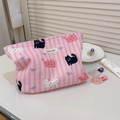 Detailed view of pink striped canvas makeup bag with cute cat prints and fabric label - Pink Stripe Cat