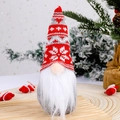 Christmas gnome doll with red snowflake knit hat and long white beard on festive background - Snowflake Red Knitted Hat Style