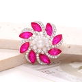 Macro shot of rose red marquise crystal flower brooch with white pearls and silver alloy - Rose Red