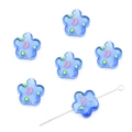 Blue glass flower beads for DIY jewelry making with a metal needle on white background - Sky Blue