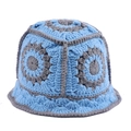 Close-up of handmade crochet bucket hat featuring blue and grey floral knit patterns - Blue