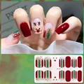 Detail view of Christmas gel nail stickers with reindeer and glitter patterns, model CS-423 - CS423