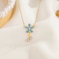 Collana in argento S925 con pendente a fiore blu, catena dorata e nappe eleganti - Argento 925 / D324 Oro Giallo (con Catena a Croce)