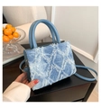 Light blue denim tote bag with frayed diamond patterns and matching blue PU handles - Blue