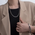 Pulsera de acero de titanio plateada con cuero negro trenzado en estilo retro chic - Juego (Incluye Pulsera y Collar)