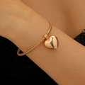 Bracciale a catena serpente multistrato dorato con ciondolo a cuore lucido esagerato - Bracciale con Ciondolo a Cuore Oro (1911)