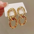 Macro view of gold chain earrings with textured hammered finish and high-polish surface - Double Link Chain Hammered Texture / Gold Chain Style