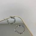 Close-up of silver geometric beaded hoop earrings reflecting on a mirror surface - Metal Cube Hoops-Platinum Silver