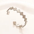 Bracciale rigido aperto a quadrifoglio in argento con finitura martellata in acciaio - Stile 04 Argento