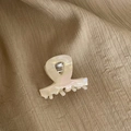Elegant pearl white ribbon hair claw clip in a minimalist crossover acetate design - Iridescent White