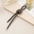 Detail of luxury dark gray rhinestone woven keychain with a metal spring ring clasp - Knot Rhinestone Chain Pendant / Gray