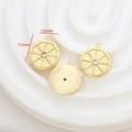 Detailed view of 15mm gold-plated ship wheel charm with cubic zirconia for DIY jewelry - Rudder Pendant