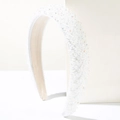 Macro detail of luxury white crystal beaded headband with non-slip fabric inner lining - White