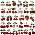 Selezione di ciondoli a ciliegia e cuore con strass e dettagli in lega di metallo dorato - Set Misto 30pz Ciliegia Fragola Mela Smalto Strass