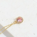 Exquisite gold choker with a round pink zircon pendant surrounded by white crystals - Pink