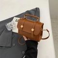 Brown vintage matte leather crossbody bag with golden metal buckle and top handle - Brown