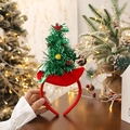 Cute red Christmas headband with a mini green Christmas tree and festive bell decor - Red Headband Christmas Tree