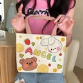 Beige canvas handbag with pink handles featuring a cartoon bear and ANGEL print - Angel Bear Rabbit