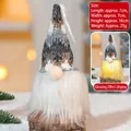 Close-up of a glowing Christmas gnome ornament with size dimensions 7x7x16cm and LED light - Glowing Ornament 302-B