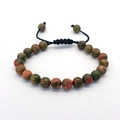 Adjustable woven bracelet with natural unakite beads featuring green and reddish textures - Unakite