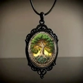 Macro shot of vintage gothic oval pendant featuring an embossed tree of life design - 30*40 Tree of Life 02