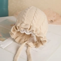 Beige knit baby hat with ruffled lace trim and adjustable chin straps for infants - Milk White - Not Lined