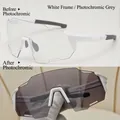 Detail of photochromic lenses showing clear to dark grey transition on white frames - White Frame Photochromic Grey