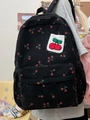 Zaino giapponese in velluto a coste nero con ciliegie indossato da modella - Nero