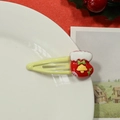Detail shot of a festive red Christmas stocking decor on a yellow BB hair clip - Beige Christmas Sock Hair Clip