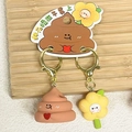 Funny cartoon poop and flower couple keychain set with golden metal rings on wood base - Flower & Dung (Funny)