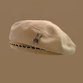Beige wool beret hat with vintage metal rabbit brooch and gold chain detail - Rabbit with Chain / Off White
