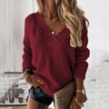 Detail of burgundy V-neck chunky knit sweater with stylish metal jewelry and accessories - Burgundy