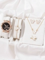 Primer plano de conjunto de joyas mariposa con reloj de cuero blanco en seda - Juego Reloj Mariposa Blanco (Caja Naranja)