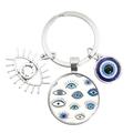 Blue Evil Eye keychain with silver hollow charm and glass Nazar beads on a white background - Multiple Blue Eye Patterns (12)