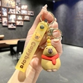 Cute brown capybara keychain with orange on head and translucent yellow wrist strap - B241-3 Scarf