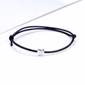 Adjustable black cord bracelet featuring a polished silver heart-shaped charm - Black/Silver